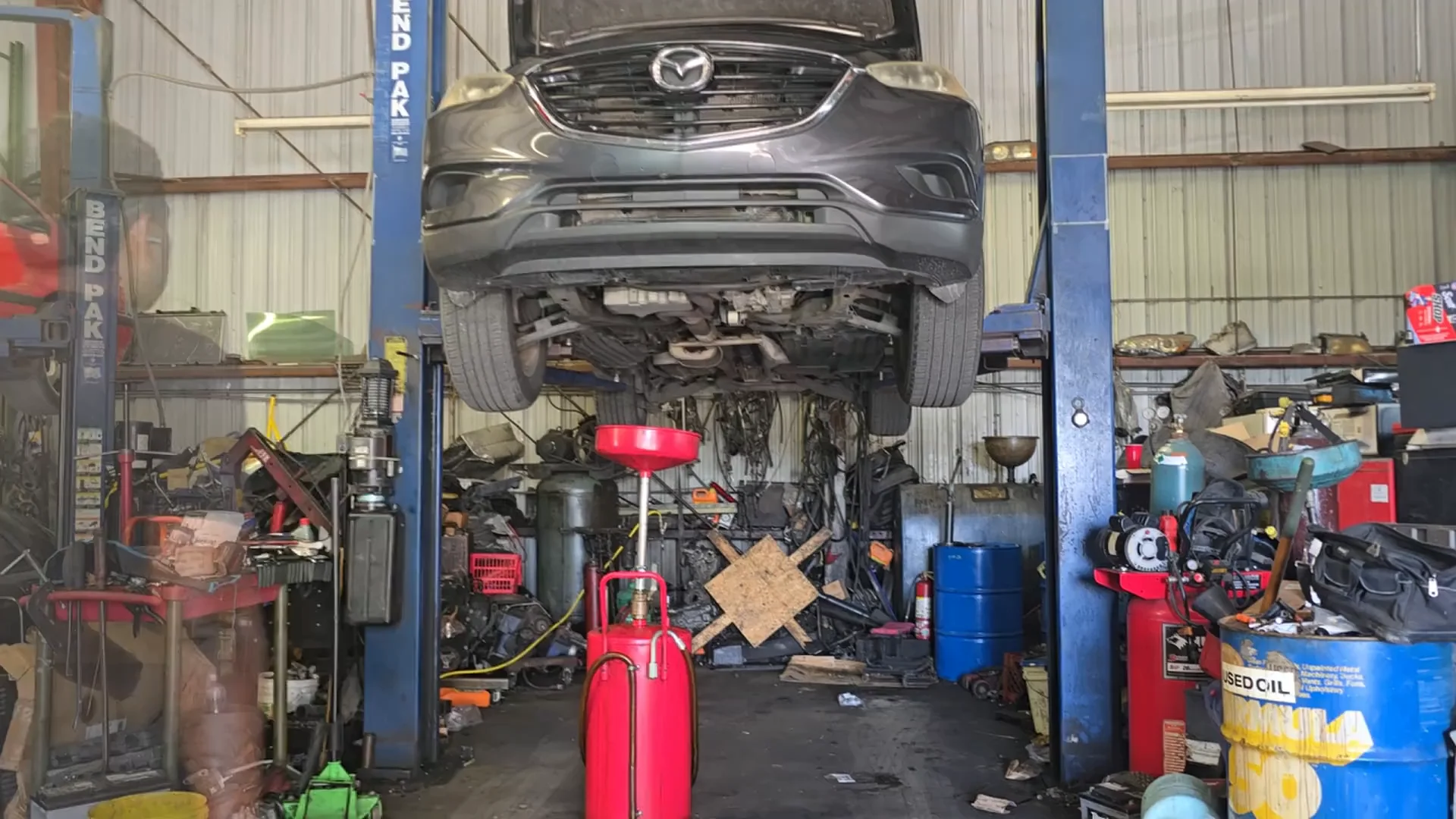 A car on the lift in our Oakland Park service bay